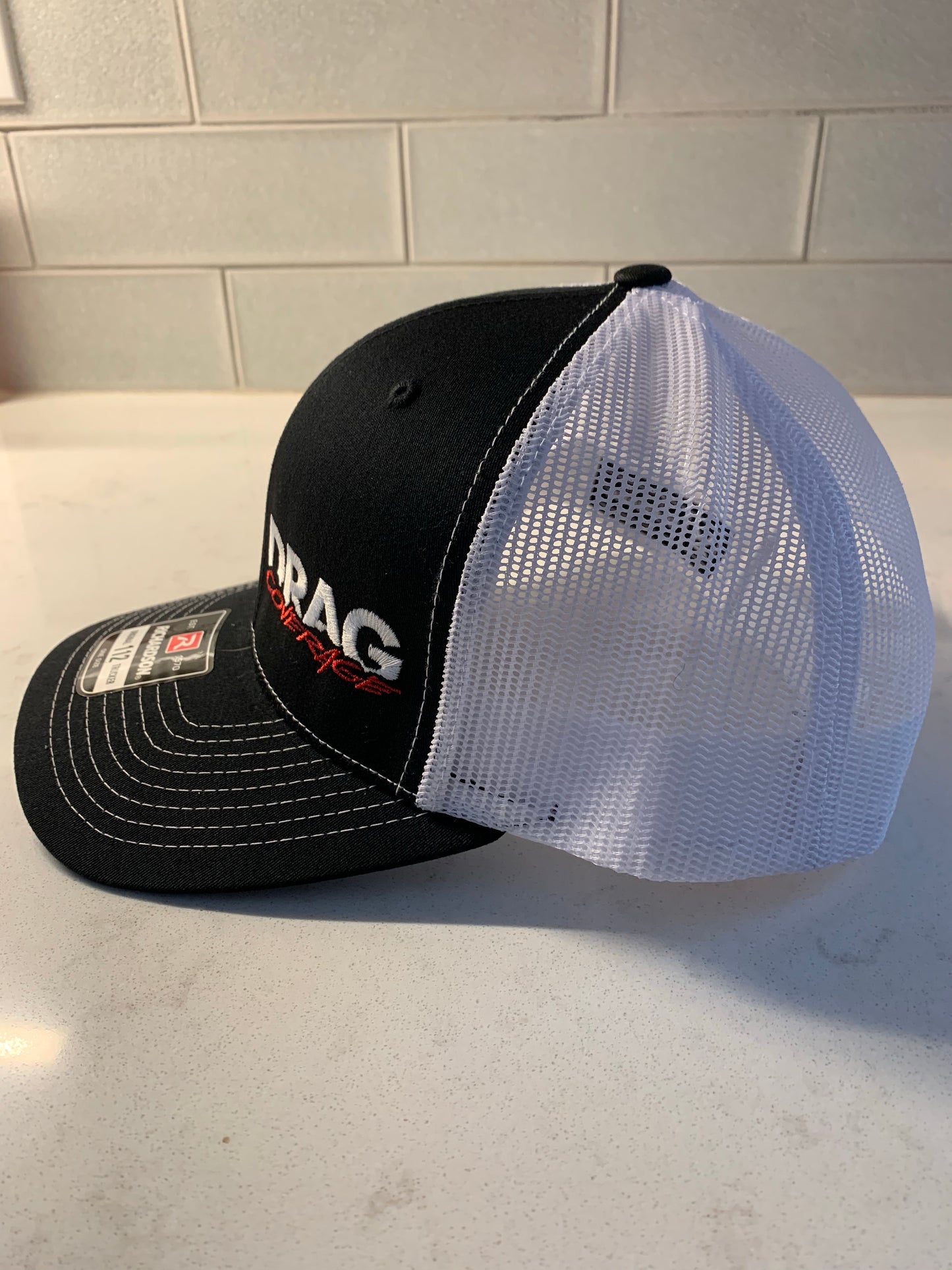 DragCoverage Black & White Trucker Hat